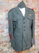A US Marine Corps green service tunic an