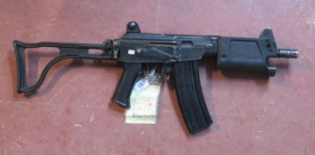 A deactivated Micro Galil 5.56mm MAR ass