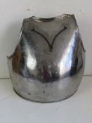 A front armour plate with straps. For de