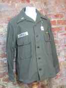 A US Army olive green wool field shirt a