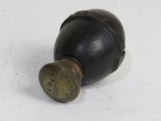 An inert WWI German Egg grenade with transit plug.