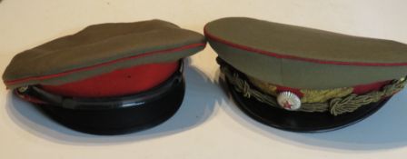 Two Soviet Visor caps, one dated 1990.