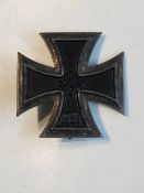 A reproduction WWII German 1st class Iron Cross.