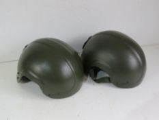 Two British Army Air Corp helmets, dated 1999 and 2005, one standard, one large size.