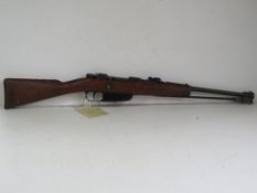 A deactivated Carcano M91 6.5mm rifle, stamped 1936.