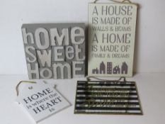 Four contemporary decorative signs.