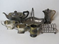 A quantity of silver plated wares including teapot with wicker wrapped handle,