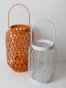 Two painted metal tealight lanterns.