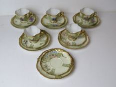 A French porcelain tea service for six marked MR to base, one cup deficient,
