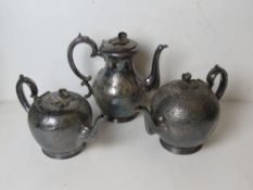 A Walker & Hall silver plated teapot, hot water pot and matching coffee pot,