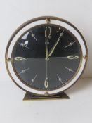 A mid century Metamic mantle clock.