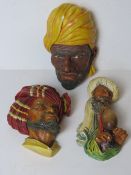 Three Bossons chalkware wall plaques.