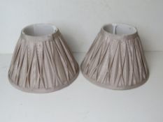 A pair of satin table lamp shade.