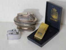 A c1980s gold plated Sunnex lighter in original box,