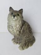 A large Royal Doulton model 1867 of a grey Persian cat.