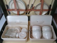 A vintage Sirram picnic basket having original plates, cups and saucers (one different colour),