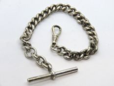 A HM silver guard chain having clasp and T bar upon, 32.5g.