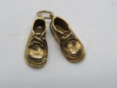 A 9ct gold pendant or charm in the form of a pair of shoes, Birmingham hallmark,