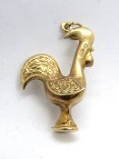 A Portuguese Cockerel pendant, Continental? hallmark, approx 32mm not inc jump ring, 3.