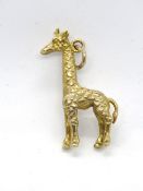 A 9ct gold Giraffe pendant, hallmarked 375, approx 3cm high, 4.2g.