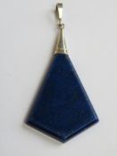 A large Lapis Lazuli pendant with white metal bale measuring 6cm inc bale.