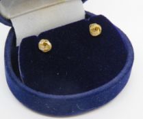 A pair of small Russian knot style stud earrings with 9ct gold butterfly backs.