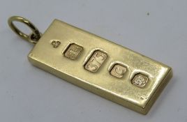 A 9ct gold ingot pendant, 30.3g, hallmarked for London 1977 Silver Jubilee year.