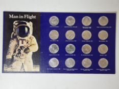 A complete collection of 'Man in Flight' commemorative coins produced by Shell.