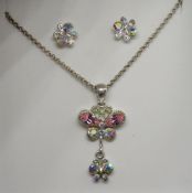 An Australian crystal suite of butterfly jewellery comprising pendant and stud earrings,
