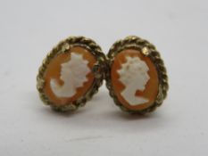 A pair of 9ct gold cameo stud earrings with butterfly backs, hallmarked 375 to the stud, 1.4g.