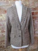 A wool blend ladies blazer size 12.