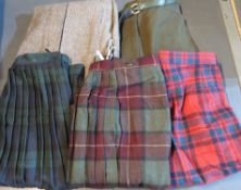 Five ladies skirts inc tweed and tartan designs.