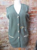 A ladies Landhaus size 10/12 waistcoat having embroidered shepherd scene upon.