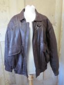 A brown leather mens coat by B&S, size medium.