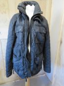 A mens XL Superdry waxed cotton jacket.