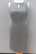 A suit type sleeveless dress by Planet, approximate measurements 37