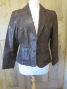 A brown leather jacket size 14.