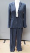 A 19% wool ladies navy pinstripe trouser suit by Laura Brooke, jacket and trousers size 12.