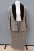 A ladies skirt suit by Alexon 97% wool, jacket size 12, skirt size 10.