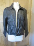 A black leather ladies coat by Amaranto, size 16.