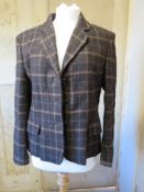 An 80% wool 20% alpaca ladies jacket size 16.