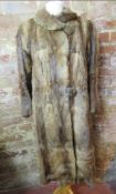 A vintage Musquash London made 3/4 length fur coat.