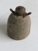 An inert WWII German concrete AP mine with an egg grenade fuse.