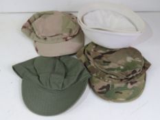 A US Army Type A-3 cap, size 7 ¼, a hot weather BDU cap, size 7 ¾,