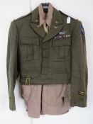 A WWII Regulation Officers tunic, shirt and tie, with Airforce badges,