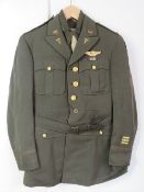 A WWII US Airforce tunic, shirt, tie, trousers and belt,