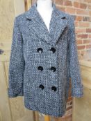 A ladies 2% wool coat size 18.