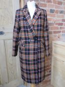 A ladies coat by Papaya size 10.