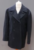 A navy blue felted woollen coat by Deben