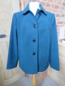 A ladies size 16 teal blue coat by BHS.